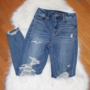 American Eagle, distressed Curvy Hi-Rise Jegging- Next Level Stretch .......